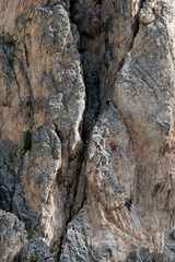 people practice climbing in the mountains of the Val di Fassa
