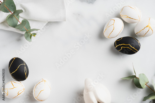 Luxury Easter Flat Lay Composition With Black And Golden Eggs Eucalyptus Leaves Bunny Rabbit Towel On Marble Table Happy Easter Concept Top View Wall Mural Photoguns