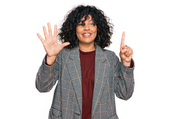 Young hispanic woman wearing business clothes showing and pointing up with fingers number six while smiling confident and happy.