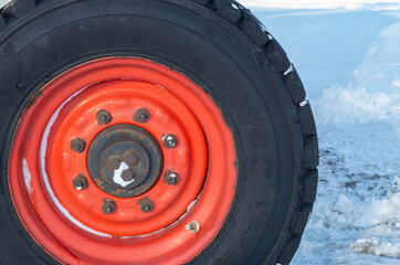 Obraz na płótnie Canvas Car Tires on a snow-covered winter road.