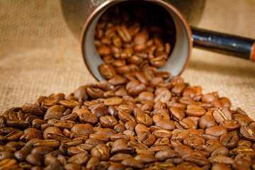 macrophotography of coffee beans and turkish coffee pot