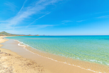 Blue sky and turquoise water in Cala Sinzias