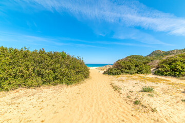 Path to the beach in Cala Pira shoreline