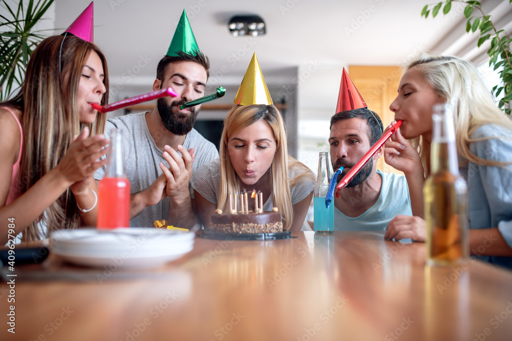 Poster Group of friends celebrating birthday at home