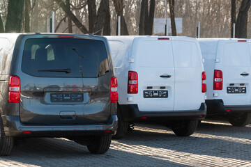 A lot of new vans in a row	