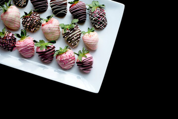 Colorful Strawberry Covered Chocolate on Black Background