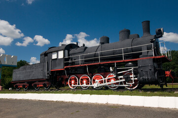 Fototapeta na wymiar Old locomotive (engine) in Piatykhatky
