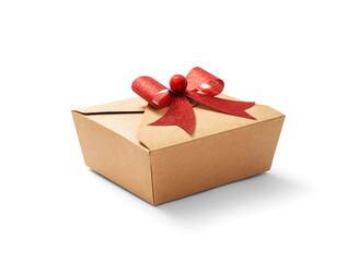 Gift cardboard box with red bow on white background, including clipping path