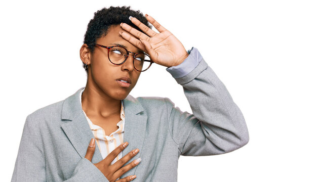 Young african american woman wearing business clothes touching forehead for illness and fever, flu and cold, virus sick