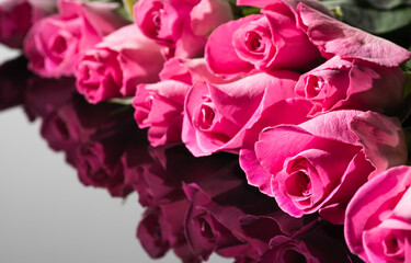 Bouquet of pink roses. Great reflection. Greeting card for Valentine's Day and birthday