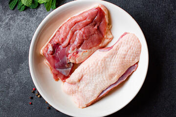 duck breast raw meat poultry barbecue grill portion on the table meal snack outdoor top view copy space for text food background rustic image keto or paleo diet