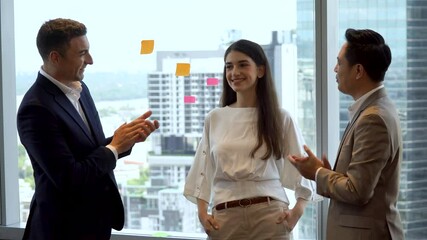 Group of diversity business People Applauding or clapping hand to celebrating victory of achieving goals to colleague woman in meeting room on window in office over building background cityscape