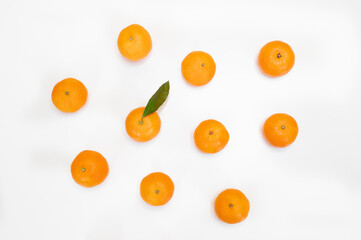Fruit pattern of fresh orange tangerine or mandarin isolated on white background. Flat lay, top view. Citrus in minimal style
