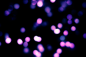 Bokeh christmas lights defocused on black background