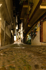 Night view of the tiny streets of an ancient village in the north of Extremadura, Spain.