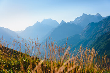 Scenic view of high mountains in the morning at sunrise