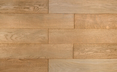 Light brown wooden parquet panels texture background