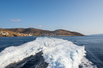 Water trail foaming behind a ferry boat in Aegean Sea near Sikinos island. Cyclades, Greece.