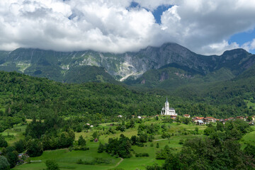 Fototapeta na wymiar Church of the Sacred Heart and village of Dreznica near Kobarid Slovenia