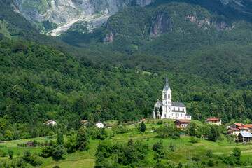 Fototapeta na wymiar Church of the Sacred Heart and village of Dreznica near Kobarid Slovenia