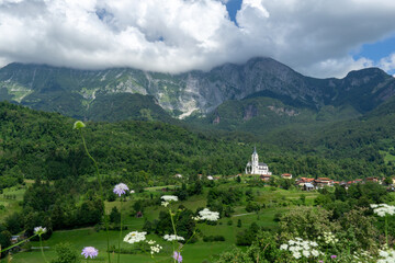 Church of the Sacred Heart and village of Dreznica near Kobarid Slovenia