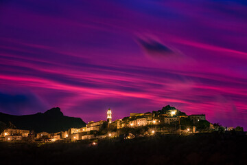 Dramatic evening sky over Speloncato in Corsica