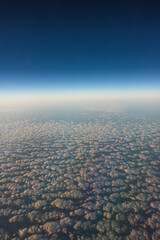 Travel view window plane  with mountains and clouds at background. Space for text.  Concept Image