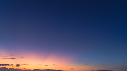 Dusk sky with colorful sunlight in the evening on twilight dark blue sky