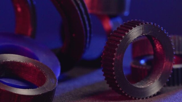 Replacement parts for machine tools in factories, printered on 5D 3D printers. Parts for faFused deposition modeling, 3D printer printing an object from plastic.