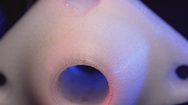 Replacement parts for machine tools in factories, printered on 5D 3D printers. Parts for faFused deposition modeling, 3D printer printing an object from plastic.