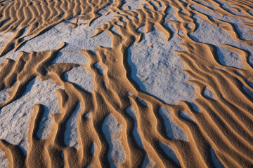 Abstract sand and snow pattern, winter, Silver Lake Sand Dunes, Silver Lake State Park, Michigan, USA