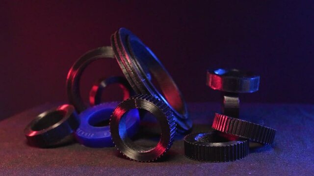 Replacement parts for machine tools in factories, printered on 5D 3D printers. Parts for faFused deposition modeling, 3D printer printing an object from plastic.