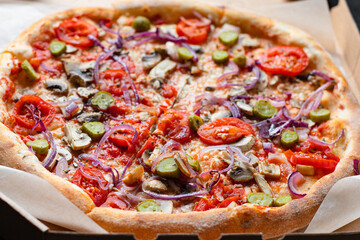 pizza vegetables tomato, onion, pickles, mushrooms, etc. vegan or vegetarian food ready to eat portion on the table for healthy meal snack outdoor top view copy space food background rustic 