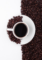 cup of coffee with beans  on white background
