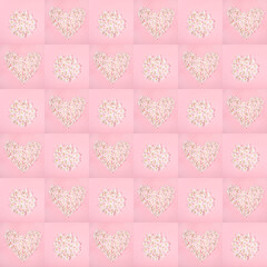 Festive floral seamless pattern of pink squares with shapes heart and circle laid out from white apple tree flowers.