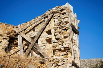 Ruins of stone tower at the medieval village of Vathia in southeastern Laconia, Peloponnese region,...