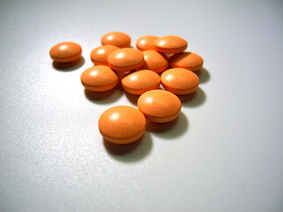 Tablets (dietary supplements) on a white background