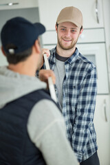 two worker build a kitchen