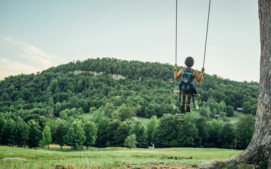 A hiker on the swing