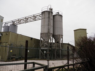 disused old cement works storage silos