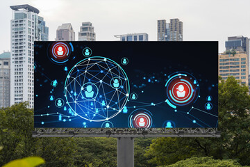 Glowing Social media icons on road billboard over panoramic city view of Bangkok, Southeast Asia. The concept of networking and establishing new connections between people and businesses.