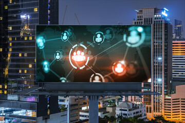 World planet Earth map hologram and social media icons on billboard over night panoramic city view...