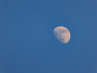 Full moon on a blue sky