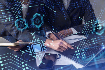 Two information technology specialist brainstorming on project to create a new approach to develop...