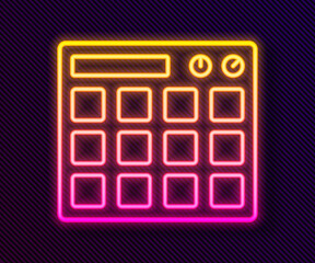 Glowing neon line Drum machine music producer equipment icon isolated on black background. Vector.