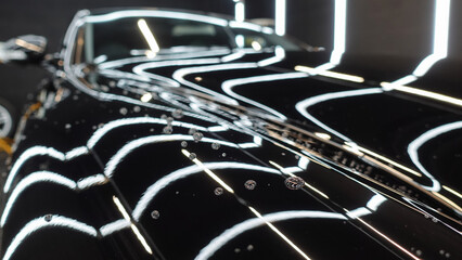 Water drops on the hood of the car