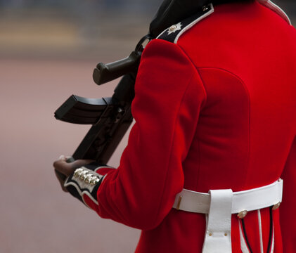 British Army Guard In Red Tunic And Bearskin On Parade At The Trooping Of The Colour Event In London