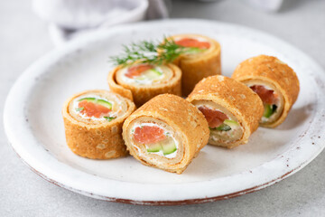 Crepe salmon rolls with herbed cream cheese. Appetizer party food