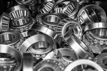 Ball bearings. Industrial steel spare parts close up background.   Machinery, engine mechanism, engineering concept.