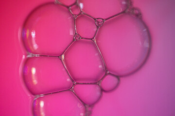 Soap bubbles macro photography with background gradient. Perfect for wallpaper.